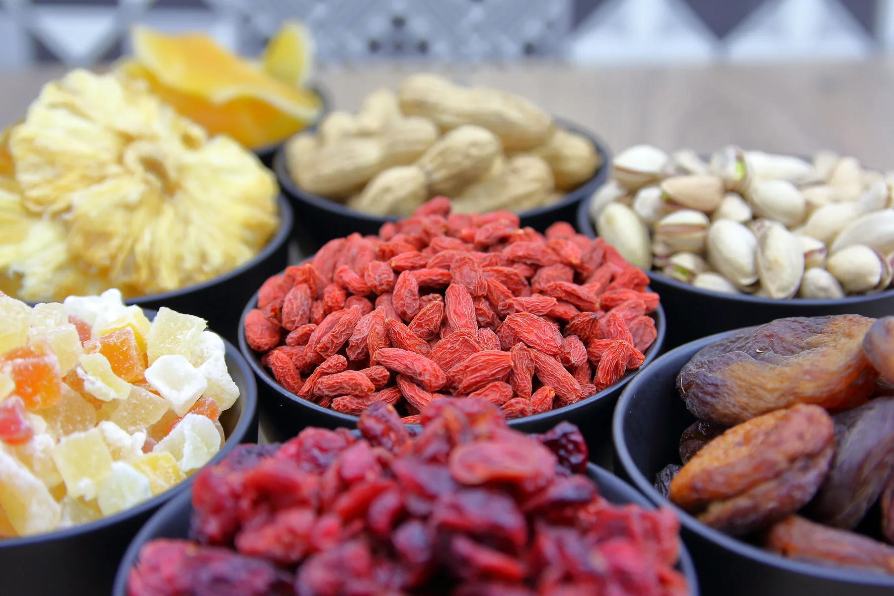 Assorted nuts and dry fruits in bowls